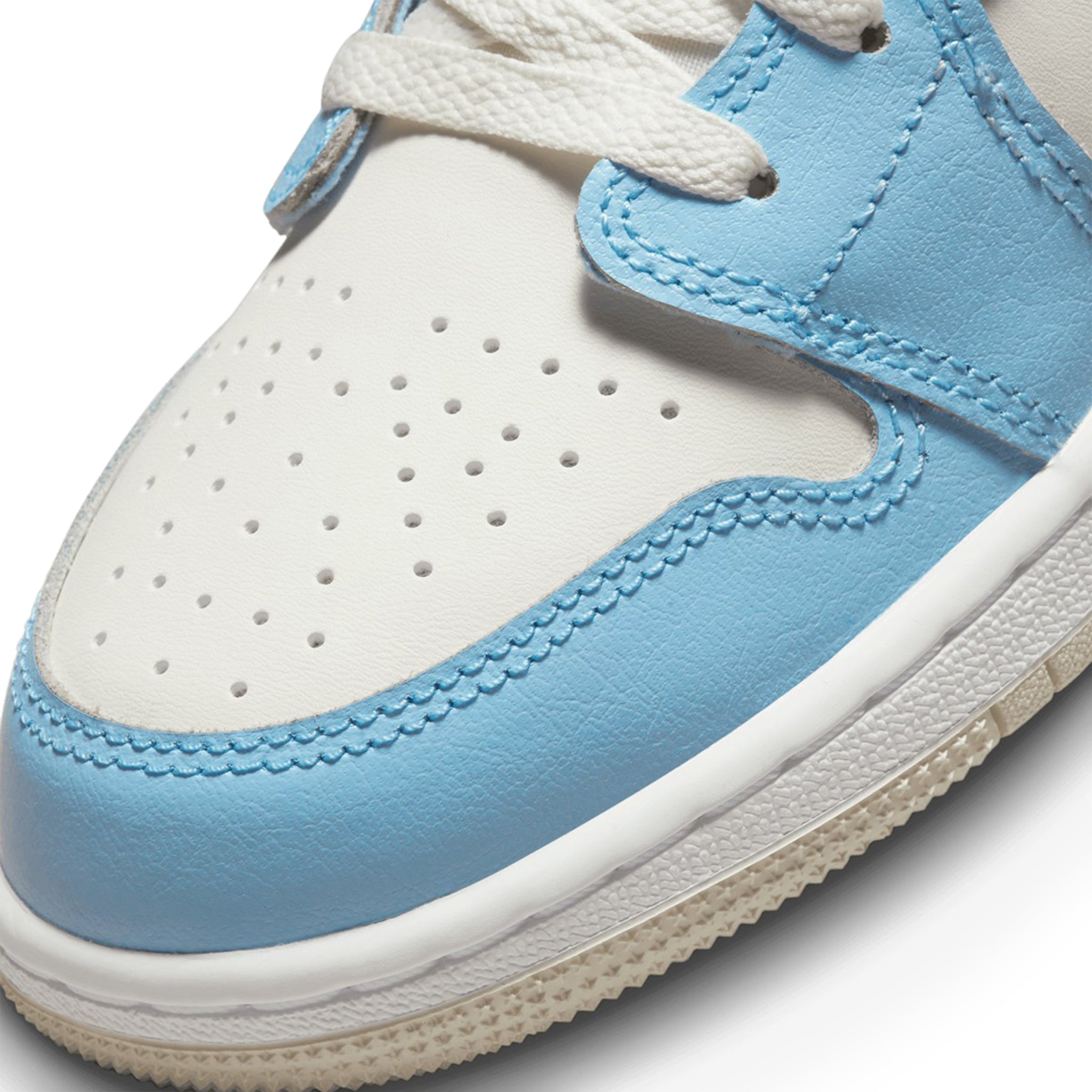 Toe box view of Air Jordan 1 Low Ice Blue Black (GS) 554723-401